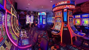 Monopoly Live studio setup on sayapbola login with mechanical wheel and live host